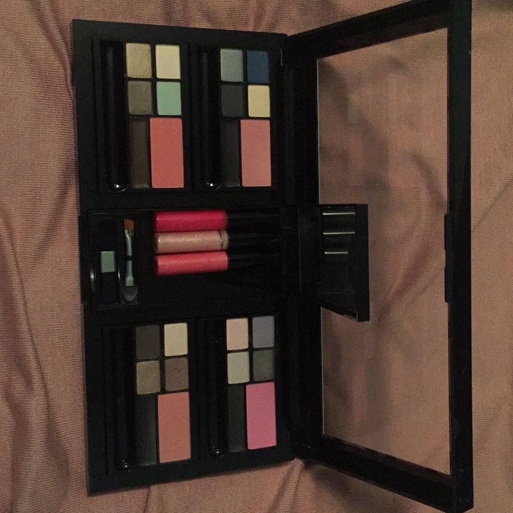 Victoria’s Secret-Eye shadow, blush, lip gloss.